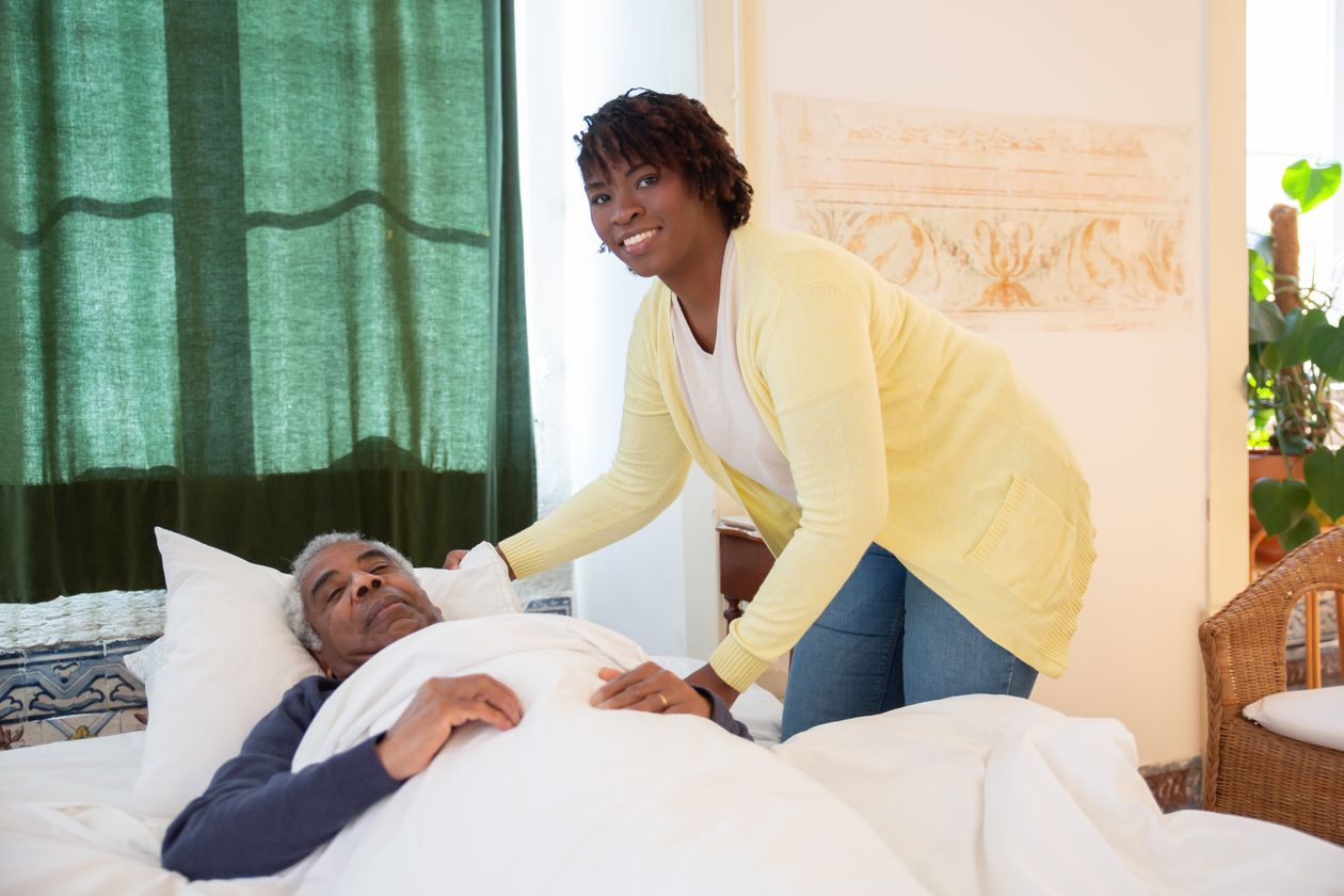 Professional caregiver providing respite care support so family members can rest